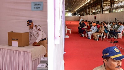 BMC and other government officials wait to cast their votes through postal voting for the Mumbai civic body elections, at a voting centre, in Mumbai on Saturday. (PTI) 