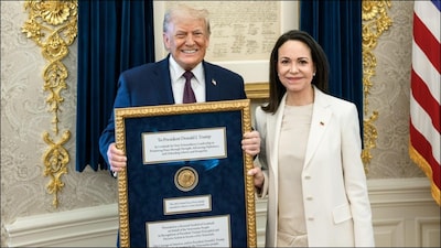 Venezuelan leader Maria Corina Machado presented her Nobel Prize to US President Donald Trump. (Photo: X)