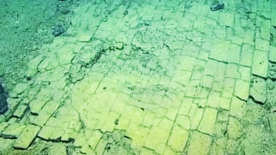 Scientists confirmed that the structure is entirely natural and is made of hyaloclastite, a volcanic rock formed when hot lava meets cold seawater. (The Ocean Exploration Trust)