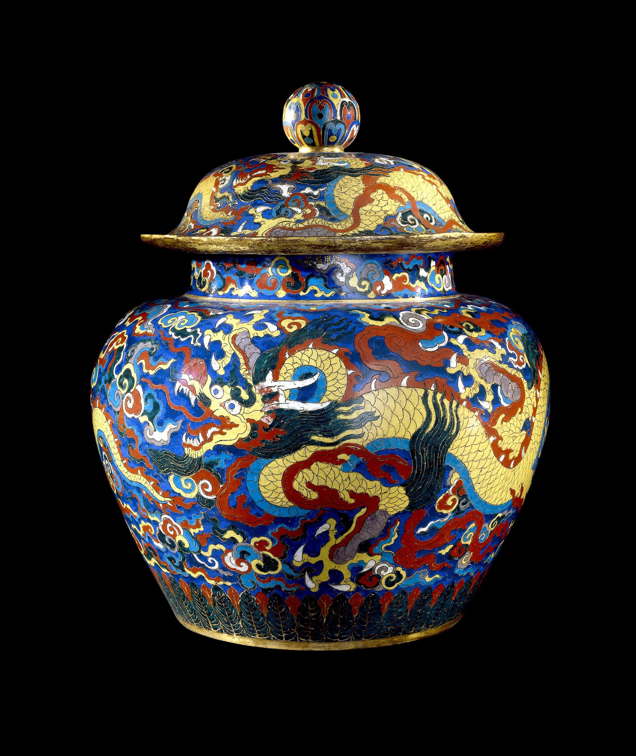 Cloisonné enamel decorated with a vigorous five-clawed dragon with open mouth, pursuing a pearl among clouds. (Image credit: The Trustees of the British Museum)