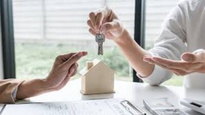 Auction notice outside a property in Bommanahalli after civic authorities moved against tax defaulters, prompting 14 owners to clear Rs 27 lakh in pending dues.