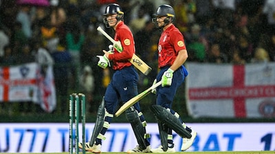 England Won By 6 Wickets Via DLS [AFP Photo]