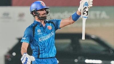 Ibrahim Zadran raises bat after scoring 50 against Canada. (Picture Credit: AP)