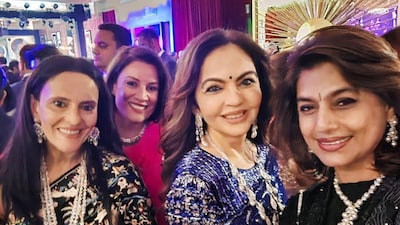 Nita Ambani dazzles in a deep indigo saree with statement diamond and pearl jewellery at Vikram Salgaocar’s pre-wedding celebration.