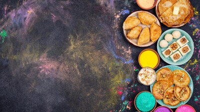 A festive spread of traditional Holi dishes and snacks, bringing together the sweet and savoury flavours of the celebration.