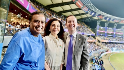 Mukesh Ambani and Nita Ambani share a moment with US Ambassador to India Sergio Gor during the ICC Men’s T20 World Cup 2026 match between India and the USA at Mumbai’s Wankhede Stadium. (X/USAmbIndia)