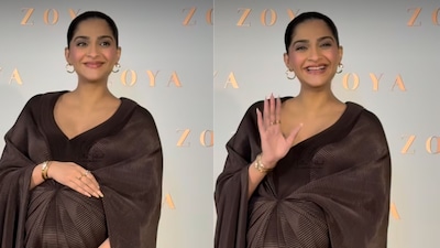 Sonam Kapoor exudes quiet luxury in a flowing chocolate-brown Amit Aggarwal ensemble, gently cradling her baby bump at the Zoya Jewels “My Embrace” collection launch.