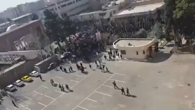 Students and demonstrators gather at a university campus during anti-government protests in Iran. (IMAGE: X/ClashReport)