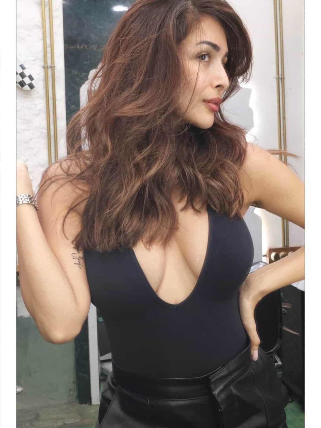 Her glossy locks cascade in rich shades of brown, catching the light perfectly and adding depth to her already radiant complexion. Her glossy locks cascade in rich shades of brown, catching the light perfectly and adding depth to her already radiant complexion.