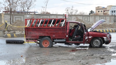 A damaged vehicle is pictured near the blast site after an attack by Baloch separatists in Quetta on January 31, 2026. (AFP)