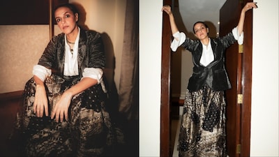 Neha Dhupia’s look balances sharp tailoring and artisanal textiles.