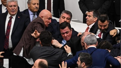 Turkey's ruling party and opposition lawmakers clash over the appointment of Istanbul Chief Prosecutor Akin Gurlek as justice minister (Photo: AP)