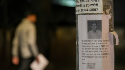 A poster of a missing person put up on a pillar, at a marketplace, in New Delhi (Photo: PTI)