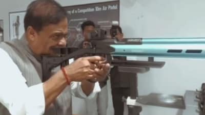The video shows an image of Assam CM Himanta Sarma shooting at a photograph. (Screenshot)