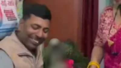 While her husband is seen smiling in the video, the post sparked a social media debate.