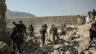 Taliban security personnel search for victims after an overnight Pakistani air strike hit a residential area at the Girdi Kas village in Bihsud district, Nangarhar province. (File pic: AFP)