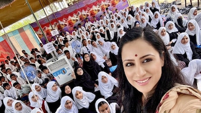 Global Teacher Prize winner Rouble Nagi seen interacting with female students at a school function in Baramulla, Jammu and Kashmir. (IMAGE: X/@ROUBLENAGI) 