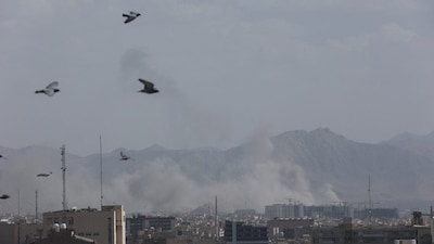 Smoke rises following an explosion, after Israel and the U.S. launched strikes on Iran, in Tehran, Iran, February 28, 2026. (Image Credits: Majid Asgaripour/WANA (West Asia News Agency) via REUTERS)