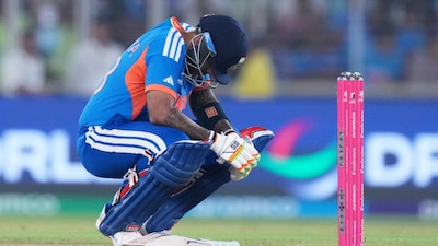 India's captain Suryakumar Yadav takes a breather after getting hit by a delivery from South Africa's Lungi Ngidi during the T20 World Cup cricket match between India and South Africa in Ahmedabad, India, Sunday, Feb. 22, 2026. (AP Photo/Ajit Solanki)