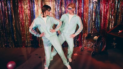 Taylor Swift debuts a brunette look in the "Opalite" video.