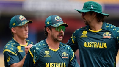 Australia's captain Travis Head, center, along with his teammates during the T20 World Cup cricket match between Australia and Zimbabwe in Colombo, Sri Lanka, Friday, Feb. 13, 2026. (AP Photo/Eranga Jayawardena)
