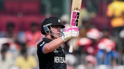New Zealand's Tim Seifert celebrates his fifty runs during the T20 World Cup cricket match between Afghanistan and New Zealand in Chennai, India, Sunday, Feb. 8, 2026. (AP Photo/Mahesh Kumar A.)
