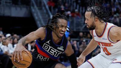Detroit Pistons guard Daniss Jenkins (24) drives against New York Knicks guard Jalen Brunson (11) during the second half of an NBA basketball game Friday, Feb. 6, 2026, in Detroit. (AP Photo/Duane Burleson)