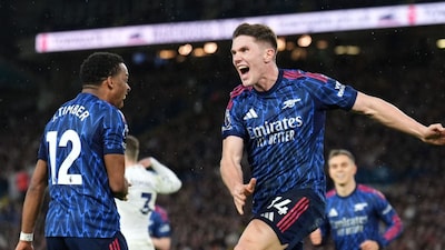 Arsenal's Viktor Gyokeres, right, celebrates scoring his side's third goal of the game with team-mate Jurrien Timber during the English Premier League soccer match between Leeds United and Arsenal in Leeds, England, Saturday, Jan. 31, 2026. (Mike Egerton/PA via AP)