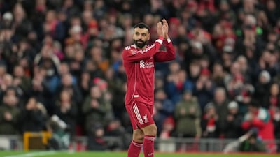 Liverpool's Mohamed Salah applauds the fans as he is substituted during the English FA Cup fourth round soccer match between Liverpool and Brighton and Hove Albion in Liverpool, England, Saturday, Feb. 14, 2026. (AP Photo/Jon Super)