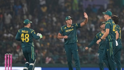 Australia's players celebrate the wicket of Sri Lanka's Kusal Perera (Picture credit: AP)