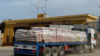 A truck carrying humanitarian aid at the Rafah border on the Egyptian side, in Rafah, Egypt. (Reuters)
