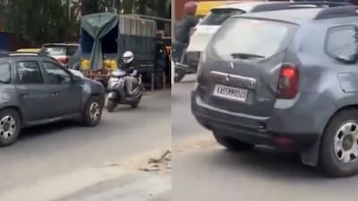 The SUV driver was forced to reverse. (Photo Credit: X)