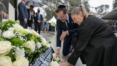 Israeli President Isaac Herzog pays tribute to victims of Bondi Beach shooting incident, on Monday. (Herzog/X)