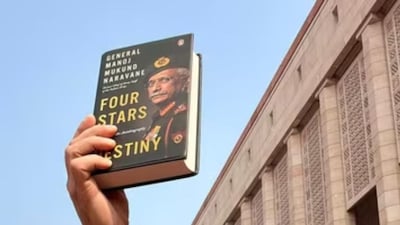 A printed copy of the unpublished book by former Indian Army chief Gen MM Naravane held up in the Parliament complex | Image: X