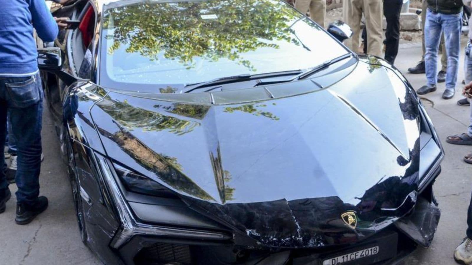 According to eyewitnesses, the car first struck an auto-rickshaw before slamming into a parked Royal Enfield motorcycle. The rider of the bike was reportedly thrown nearly 10 feet into the air. The Lamborghini allegedly dragged the motorcycle for some distance before stopping after hitting an electric pole. One of the injured, Taufiq from Yamunaganj, suffered serious leg injuries, while others sustained fractures and bruises. Residents gathered around the vehicle and prevented the driver from stepping out. Some witnesses alleged that private bouncers accompanying the accused pushed back the crowd aggressively while protesters later claimed there was pressure for compromise and delay in filing a case. Police seized the car and said, “The injured were provided primary treatment. An FIR will be registered, and further legal action will follow." According to eyewitnesses, the car first struck an auto-rickshaw before slamming into a parked Royal Enfield motorcycle. The rider of the bike was reportedly thrown nearly 10 feet into the air. The Lamborghini allegedly dragged the motorcycle for some distance before stopping after hitting an electric pole. One of the injured, Taufiq from Yamunaganj, suffered serious leg injuries, while others sustained fractures and bruises. Residents gathered around the vehicle and prevented the driver from stepping out. Some witnesses alleged that private bouncers accompanying the accused pushed back the crowd aggressively while protesters later claimed there was pressure for compromise and delay in filing a case. Police seized the car and said, “The injured were provided primary treatment. An FIR will be registered, and further legal action will follow."