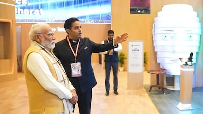 PM Narendra Modi with Reliance Jio Infocomm Ltd chairman Akash Ambani at the India AI Impact Expo in New Delhi on February 16, 2026. (Image: PMO/PTI)