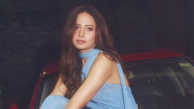 She stepped out in a blue backless gown and sparkly silver heels. (Photo Credit: Instagram)