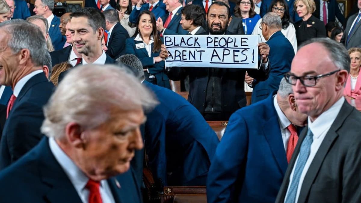 Al Green Ejected From Trump's Address After Holding Up 'Black People Aren't Apes' Sign | Video