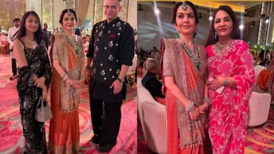 She looked gorgeous in a striking sunset orange saree (the colour of the season, apparently), which featured intricate golden embroidery.