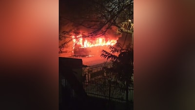 A massive fire engulfed a bus in Delhi's Vikaspuri, killing one person (Credits: News18) 