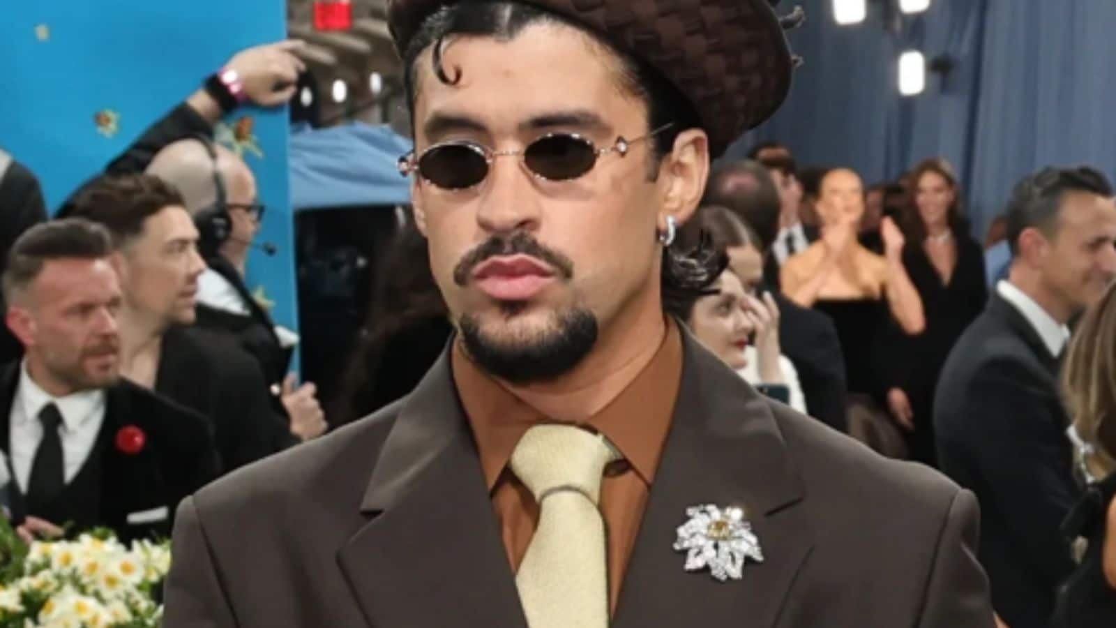 Bad Bunny’s Floral Diamond Power MoveBad Bunny knows how to make an entrance — but this time, the drama was pinned neatly to his lapel. His brooch from Cartier featured a floral design centered around a radiant yellow diamond framed with white diamonds. It was elegant, sculptural and quietly extravagant. 