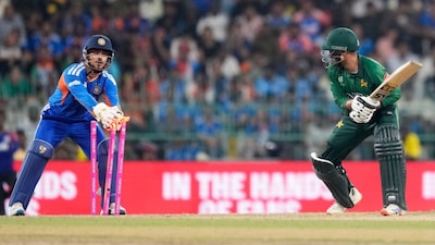 Usman Khan is stumped out by India's Ishan Kishan (Picture credit: AP)