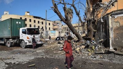 People walk past the site of Saturday's suicide bombing, in Quetta in Pakistan's Balochistan, Sunday, Feb 1, 2026.  (Image: AP)