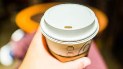 The tiny hole in the lid of the takeaway coffee cup is far more than just a design feature; it is a clever piece of practical engineering.