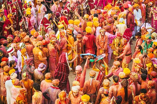 Vrindavan & Barsana: Experience Holi in its purest, most spiritual form. From flower Holi in temples to the famous Lathmar Holi in Barsana, every celebration here connects deeply with Lord Krishna’s legacy. It’s intense, emotional, and unlike anywhere else in the world.