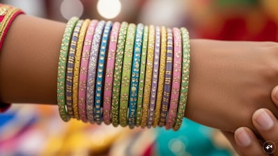 Glass, metal and lacquered bangles are back on wrists everywhere.