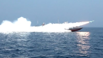 A rocket being fired from a boat during a military exercise by members of the IRGC and navy in the Strait of Hormuz. (File photo)