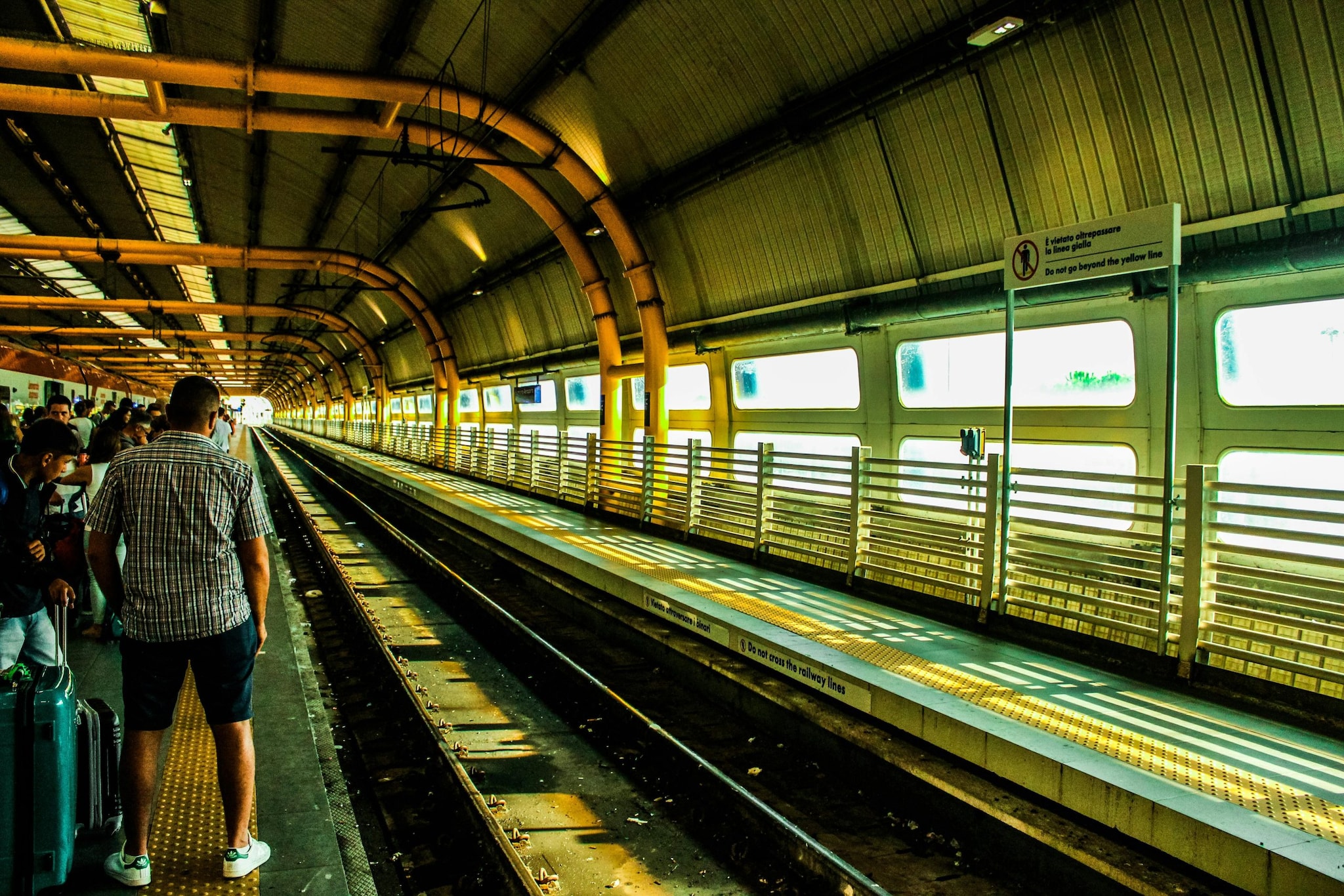 Emergency Reference: During emergencies, yellow lines provide a clear demarcation of a safe area away from tracks.