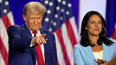 US President Donald Trump with Director of National Intelligence Tulsi Gabbard. (AP file photo)