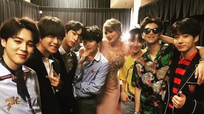 Taylor Swift and BTS share a backstage moment at the Billboard Music Awards.(Photo Credit: Instagram)